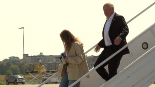 Gov. Tim Walz (D-Minnesota) leaving the plane after landing at Capital Region International Airport in Lansing