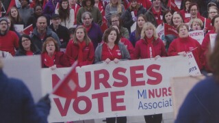 Newspaper photo of Nurses striking